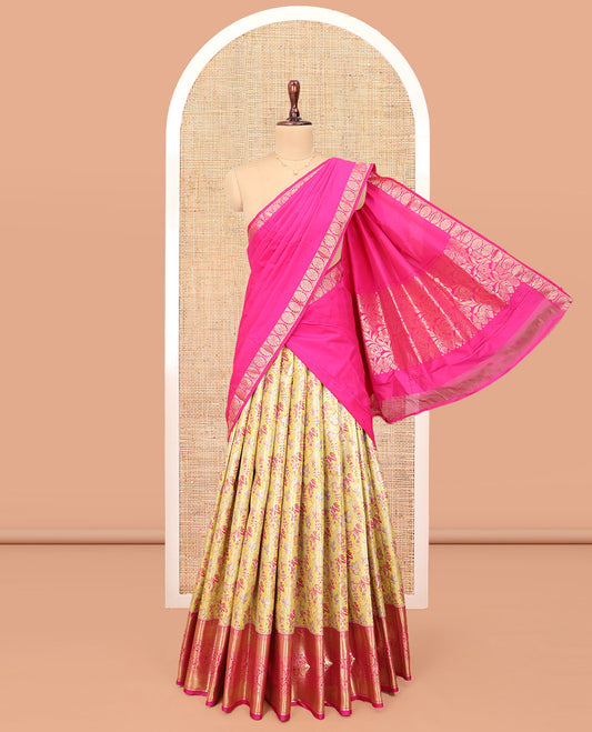 Yellow Art Silk Material Half-Saree Set, Dedicatedly Woven with Leaf Jacquard Design On Its Skirt, Complemented by Captivating Contrast Traditional Zari Designs Woven Border, Paired with a Contrast Blouse and Comes with a Floral design Woven Dhavani