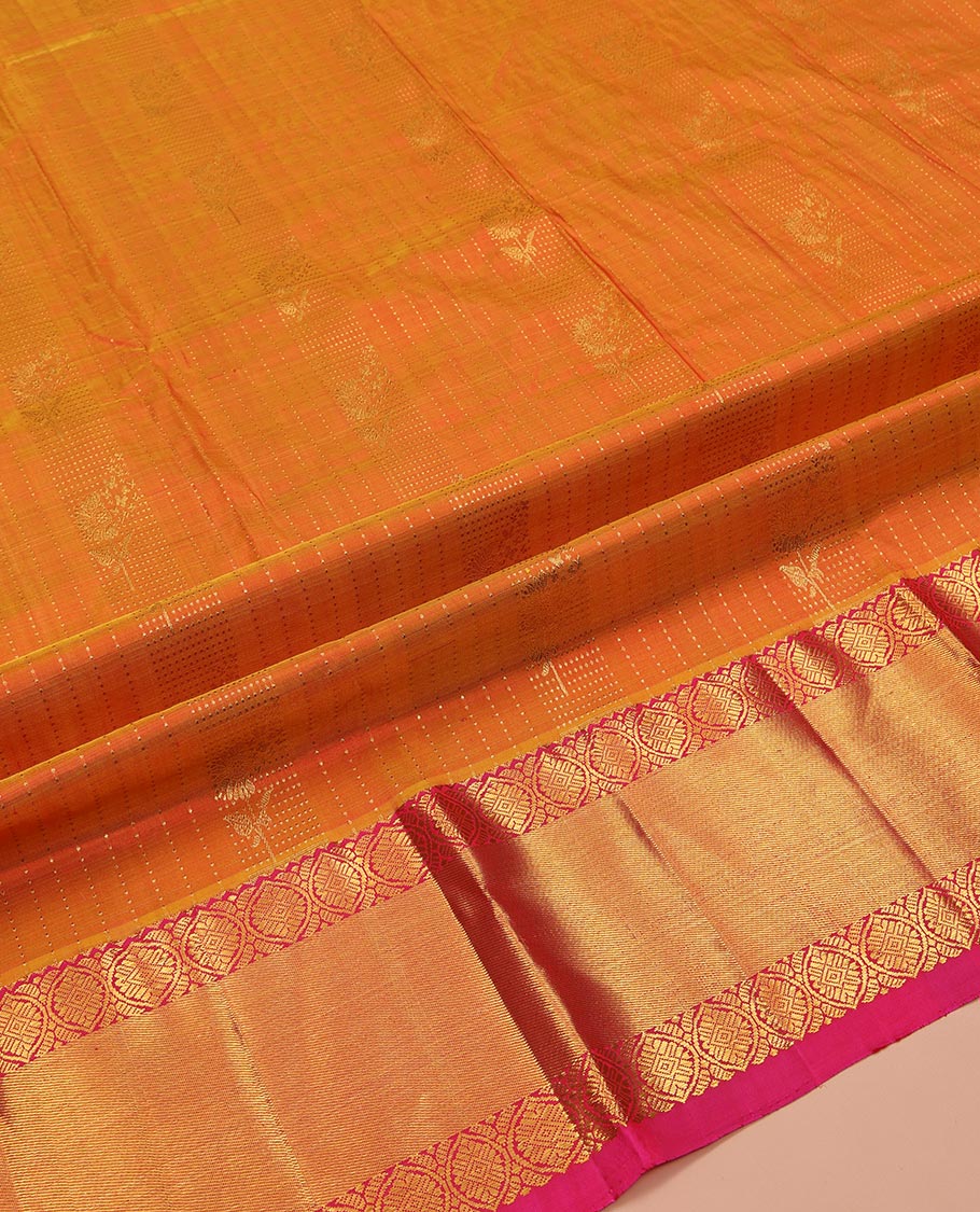 Orange Pure Silk Half-Saree, Woven with Zari Designs All Over Its Skirt, Complemented by Contrast Laddu Kamalam Border, Paired with a Contrast Blouse, and Comes with a Floral Design Dhavani