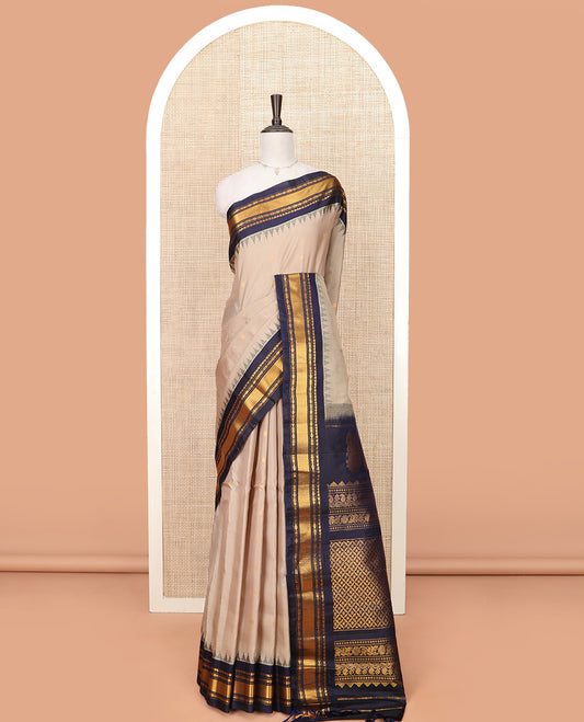 Sandal Gadwal Saree Designed with All-Over Zari Buttas, a Contrast Temple Traditional Zari Design Border, Pallu of Intricate Design, and a Contrast Blouse with Zari Designs