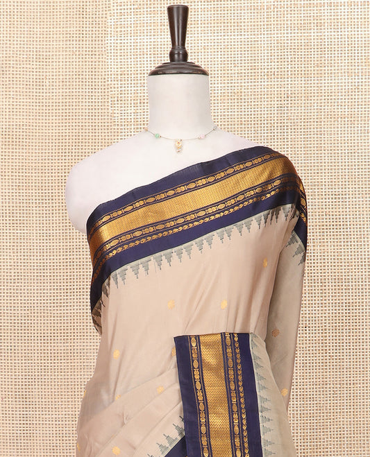 Sandal Gadwal Saree Designed with All-Over Zari Buttas, a Contrast Temple Traditional Zari Design Border, Pallu of Intricate Design, and a Contrast Blouse with Zari Designs