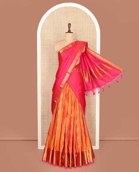 Orange Pure Silk Half-Saree, Woven with Zari Designs All Over Its Skirt, Complemented by Contrast Laddu Kamalam Border, Paired with a Contrast Blouse, and Comes with a Floral Design Dhavani