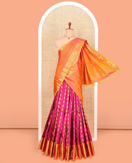 Pink Pure Silk Half-Saree Elegantly Highlighted with Zari Buttas on Its Skirt, Complemented by a Contrast  Border Featuring Rekku, Mayil Kann, Manga, and Chakram Designs, Comes with a Contrast Blouse and a Dhavani of Butta Enclosed Jaal Designs