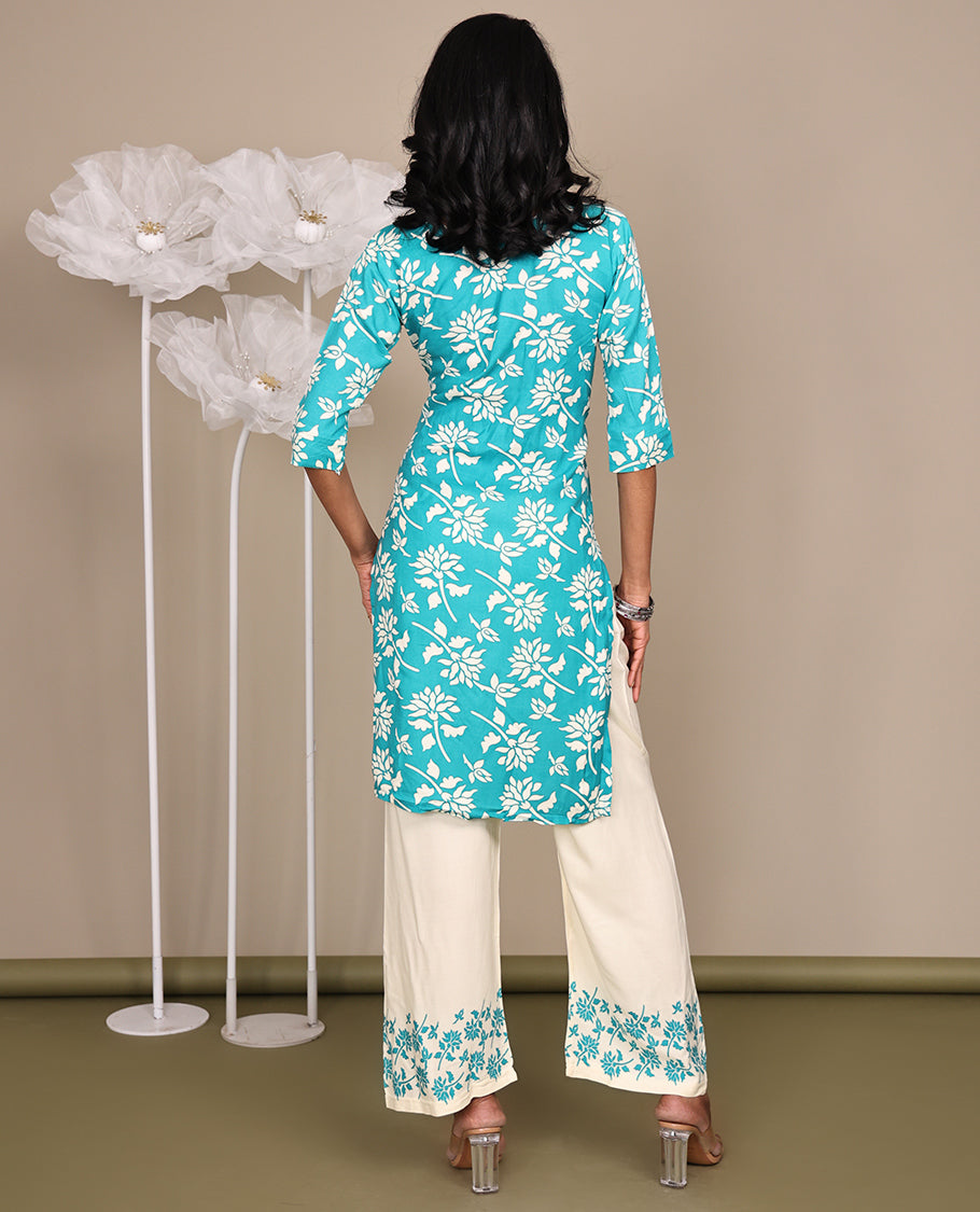 Blue Cotton Ready-Made Suit, Featuring Floral Prints, a Round Neck, 3/4 Sleeves, and a Straight-Cut Top, Paired with Floral Printed Straight-Cut Pants