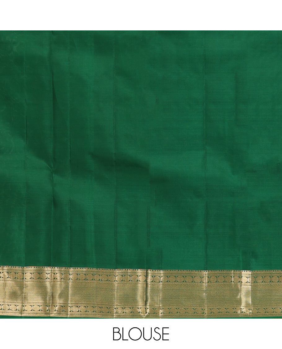 Red Vasundhara Silk Saree, Spotlighted with Chakram Buttas and Checks, a Zari Border of Rekku, and Chakram Designs, a Gleamed Up Pallu, and a Contrast Blouse