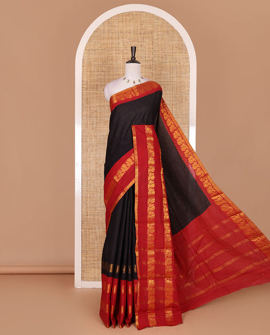 Black plain sungudi cotton saree, contrast annam motifs, gold zari woven border, zari striped, and zari design contrast blouse
