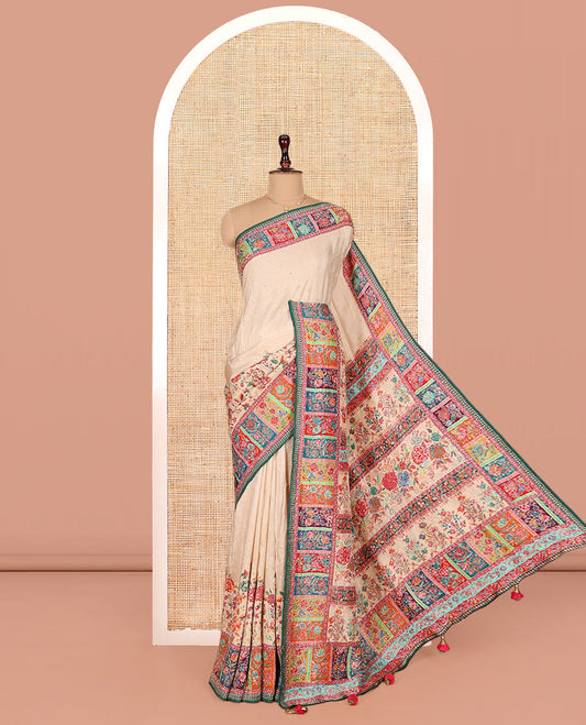 Cream Dola Silk Saree, Enthralled with Stone Struck on Its Body, Complemented by Contrast Kaleidoscopic-Colored Floral Print and Outline Embroidered Border, Pallu Mirroring the Same Design, and Paired with a Contrast Blouse