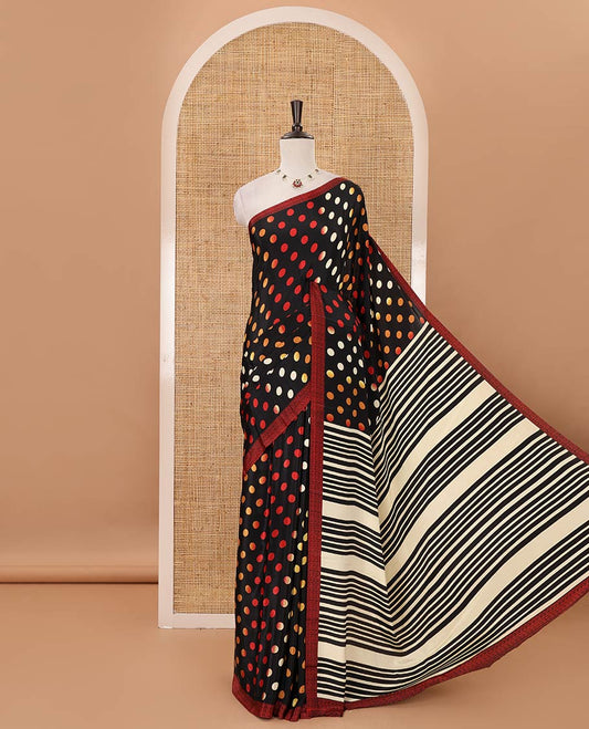 Black colorful polka dots printed satin crepe saree, contrast piping border, stripes printed pallu & contrast printed blouse