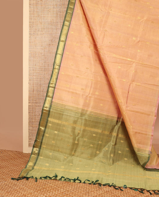 Peach buttas kancheepuram silk saree with contrast korvai intricate zari design border & floral design pallu