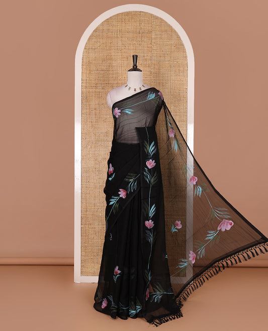 Borderless black floral motifs  hand brush painted semi-organza saree comes with tasseled pallu and without blouse