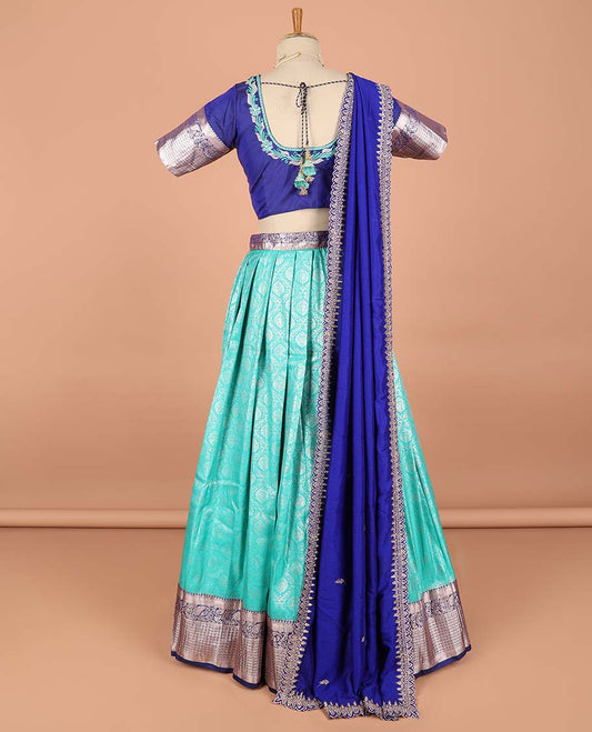 Green ogee jacquard semi-stitched half saree with contrast zari border,  embroidered blouse & scallop border dhavani