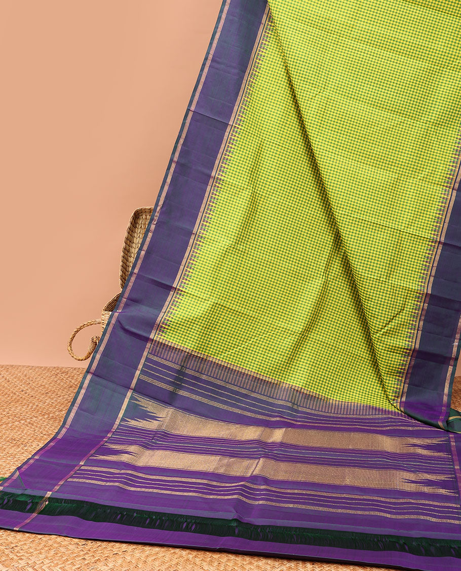 Green checked kancheepuram silk saree with contrast striped border & striped zari pallu