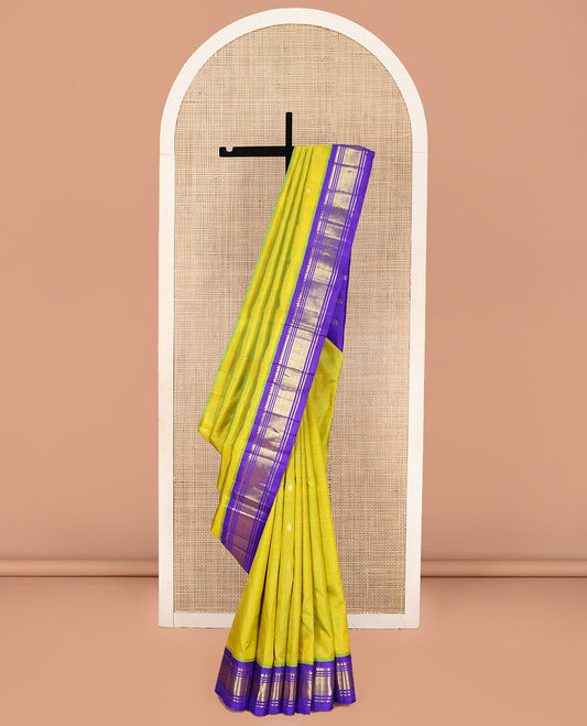 Green Kanchipuram Silk Saree, Woven with Zari Buttas on Its Body, Complemented by a Contrast One-Sided Korvai Border of Thilakam Mokku, Banaras, and Jaal Designs, Pallu of Zari Designs, and Comes Without a Blouse