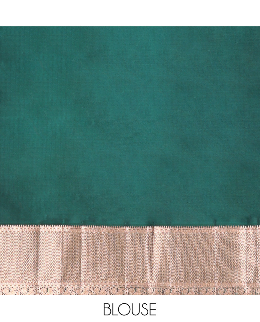 Orange Vasundhara Silk Saree, Embellished with Mayil and Yaali Butta Enclosed Checks on Its Body, Complemented by Contrast Border of Muthu, Rekku, Mayil, and Mayil Kann Designs, Grandly Decked Up Pallu, and Paired with a Contrast Blouse