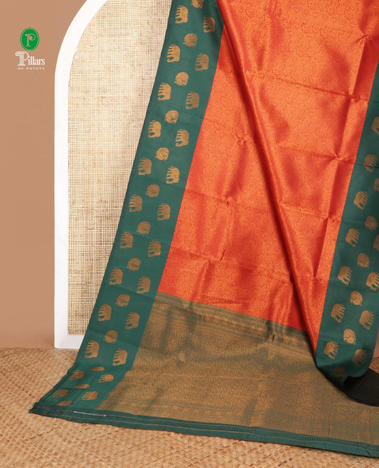 Red copper zari design litchi soft silk saree with contrast elephant, annam zari design border & rich pallu along with brocade blouse