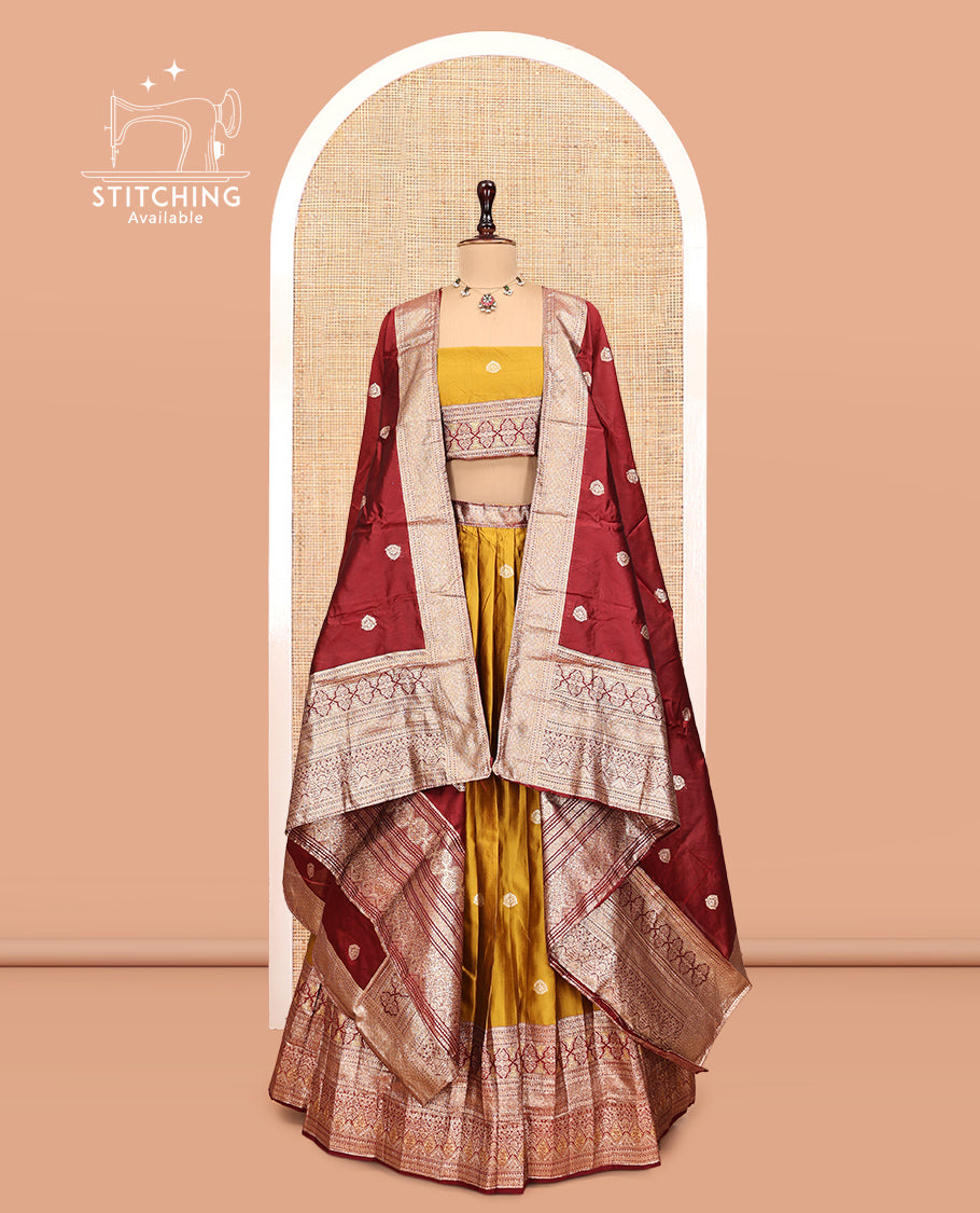 Mustard Banarasi Half-Saree, Adorned with Zari Buttas, a Contrast Traditional Zari Border, a Matching Blouse, and a Contrast Dhavani