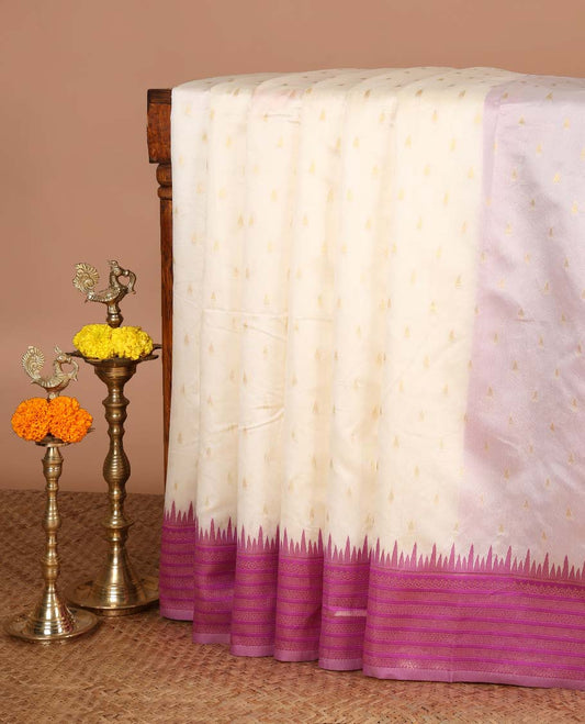 Cream with purple temple butta kanchi silk saree with temple, traditional zari border & rich weaving pallu along with butta design blouse