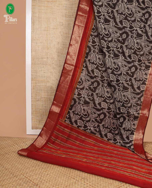 Blue floral print chanderi cotton saree with contrast mango style border & chit printed pallu along with plain zari border blouse