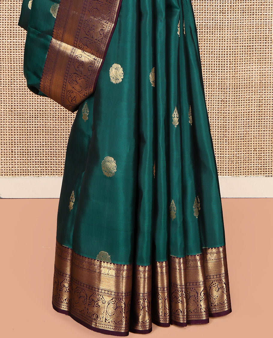 Green Vasundhara Lite Silk Mix Saree, Adorned with Zari Buttas, Contrast Border of Thilakam, Yaanai, Mayil Kann, Muthu, Kamalam, Annam, and Yaali, Jaal Pallu, and a Contrast Blouse