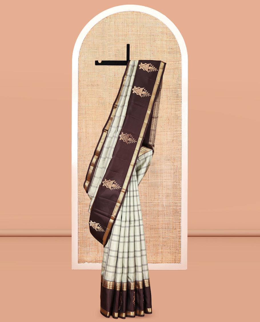 Light Beige Checked Kanchipuram Silk Saree, Complemented by a Contrast Border of Thilakam, Banaras, Neli, Kamalam, and Ara Maadam Designs, Grand Pallu, and a Contrast Blouse