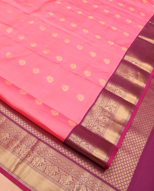 Pink Vasundhara Lite Silk Mix Saree, Mesmerized with Zari Buttas All Over Its Body, Complemented by Contrast Border of Rekku, Rudraksham, Laddu Kamalam, Yaanai, and Mayil Kann Designs, Grand Jaal Pallu and Paired with a Contrast Blouse