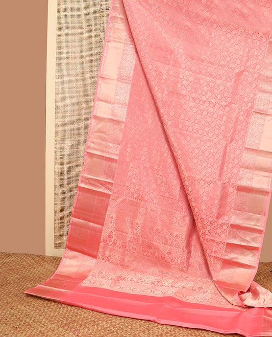 Peach floral jacqaurd kancheepuram silk saree with self intricate zari design border & floral design pallu