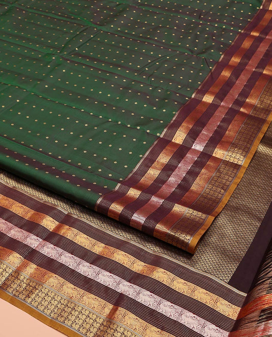 Green Vasundhara Lite Silk Mix Saree, Decorated with Zari Buttas All Over Its Body, Complemented by a Contrast Border of Muthu, Yaali, and Mayil Designs, Grand Geometric-Design Pallu, and Paired with a Contrast Blouse