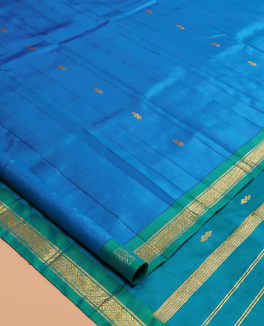 Blue Kanchipuram Silk Saree, Woven with Zari Buttas, a Contrast One-Sided Border of  Banaras, and Mayil Kann Designs, Zari Design Pallu, and No Blouse
