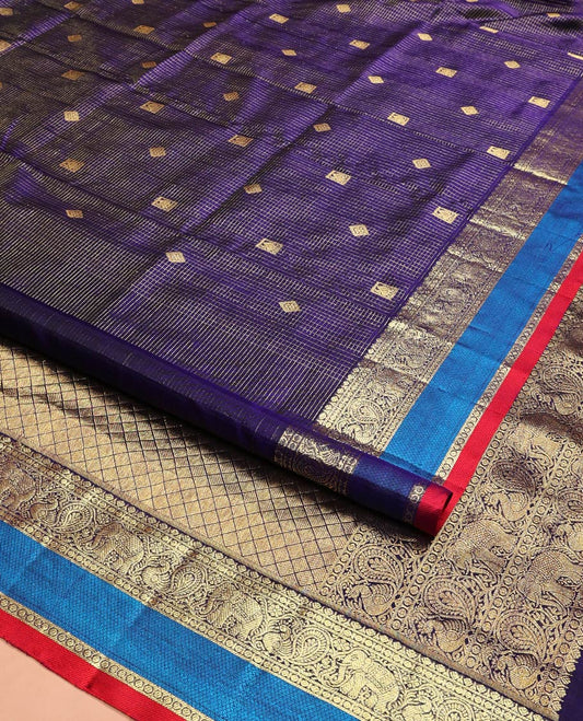 Blue Venkatagiri Silk Saree, Spotlighted with Zari Buttas Enclosed Checks All Over Its Body, Complemented by a Contrast Traditional Zari Design Border, Pallu of Jaal Designs, and Paired with a Contrast Blouse