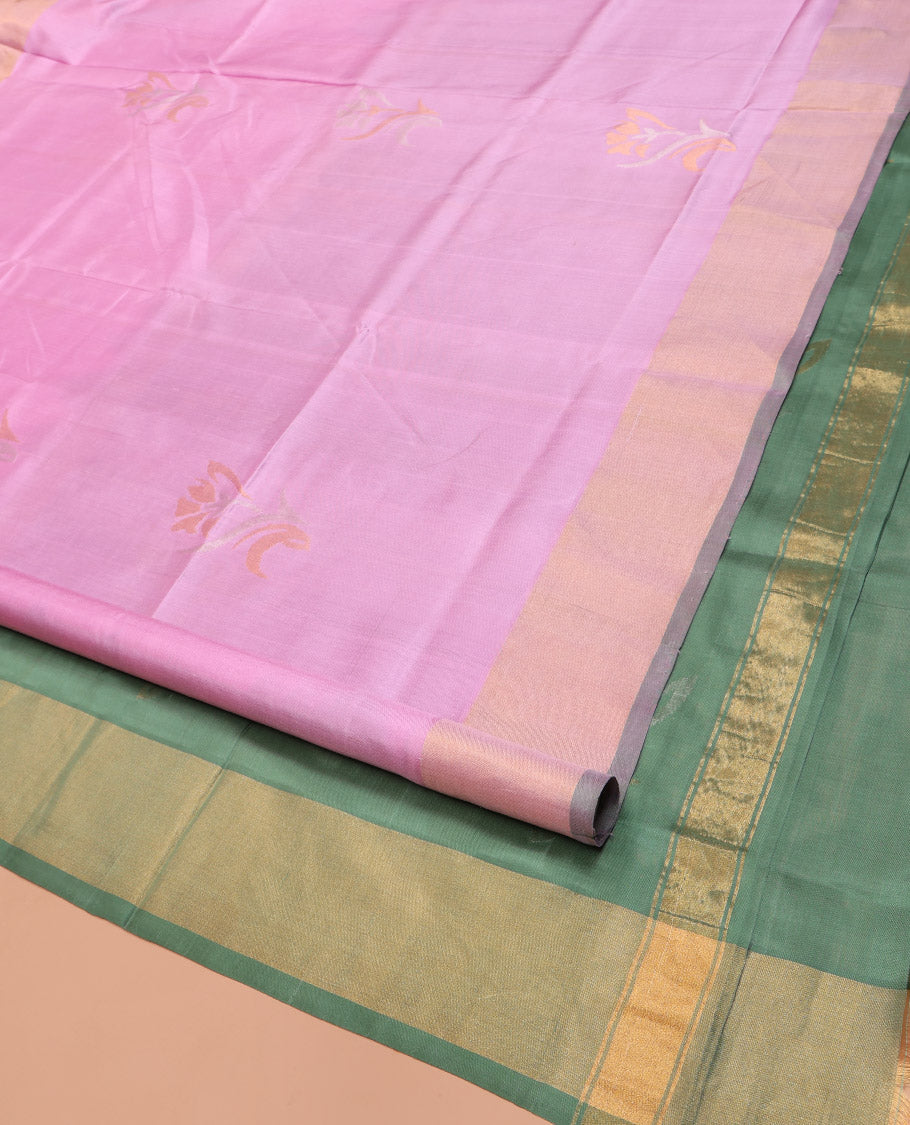 Pink Uppada Silk Saree, Detailed with Zari Buttas All Over Its Body, Complemented by a Contrast Plain Border, Pallu Steeped with Buttas, and Paired with a Contrast Blouse