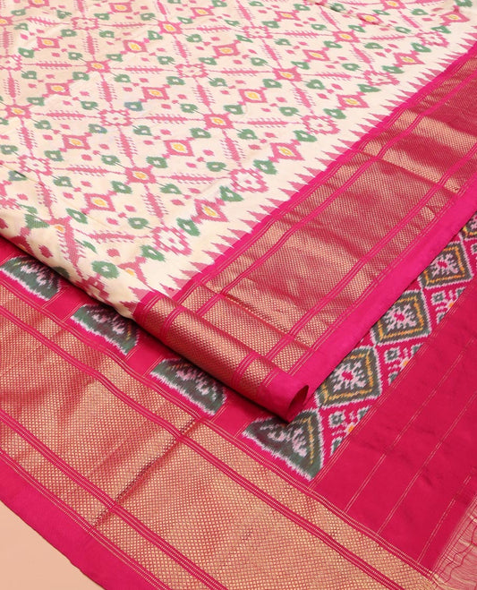 Pale Yellow Ikkat Silk Saree, Charmingly Accented with Colorful Ikkat Design Weave, Complemented by a Contrast Temple Border of Diamond Designs, Pallu Features Ikkat Diamond Designs, and Paired with a Contrast Blouse