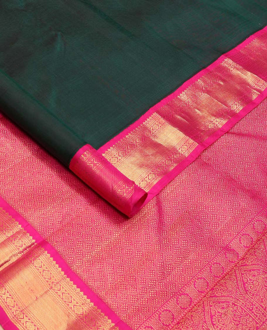 Green plain Kanchipuram korvai silk saree, contrast neer korvai border of thilakam mokku, banaras, muthu, and laddu kamalam, and jaal pallu