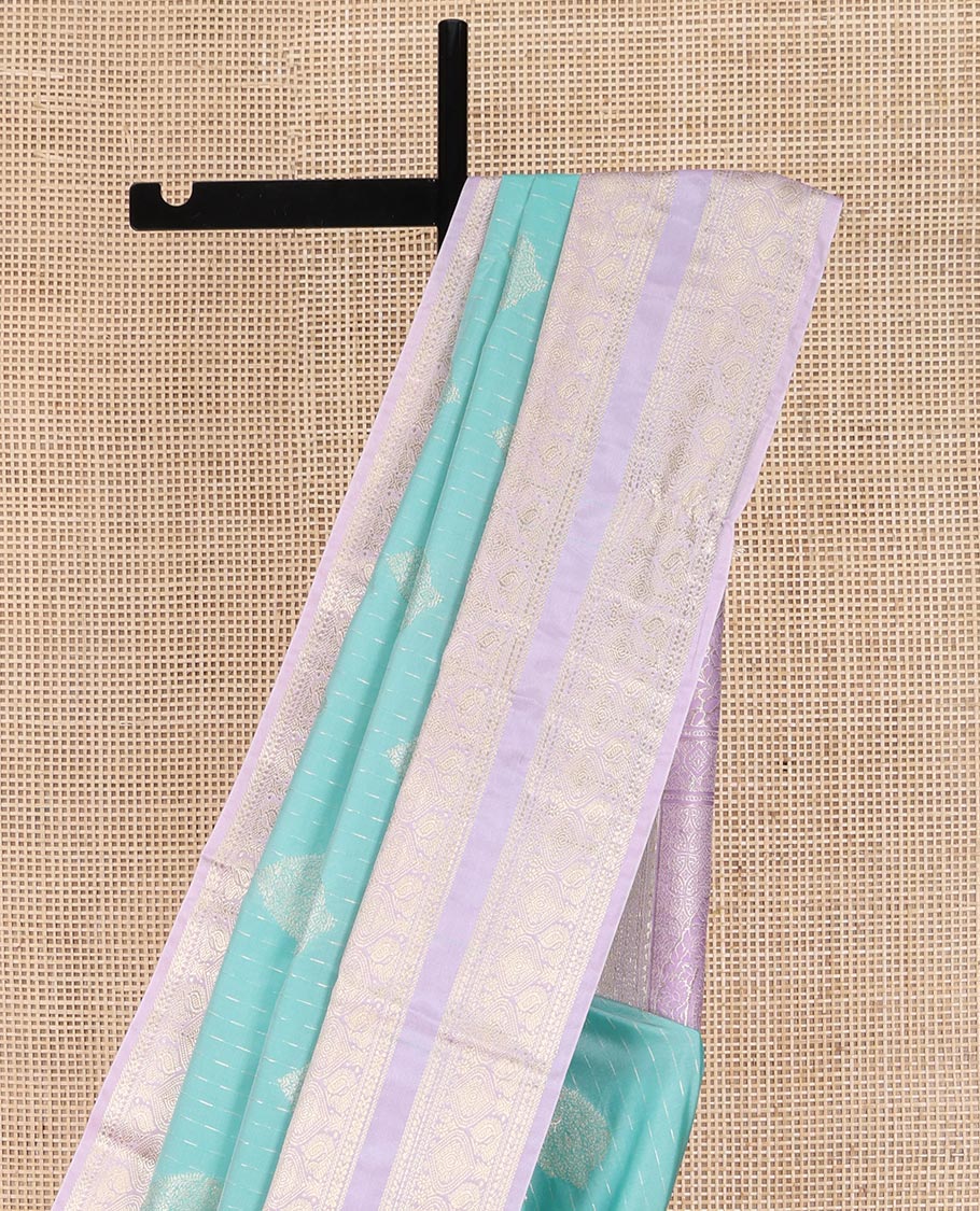 Blue Budget Silk Saree, Steeped in the Richness of Zari Buttas All Over Its Body, Complemented by Contrast Varisai Pettu Traditional Zari Design Border, an Intricately Designed Pallu, and Paired with a Contrast Blouse