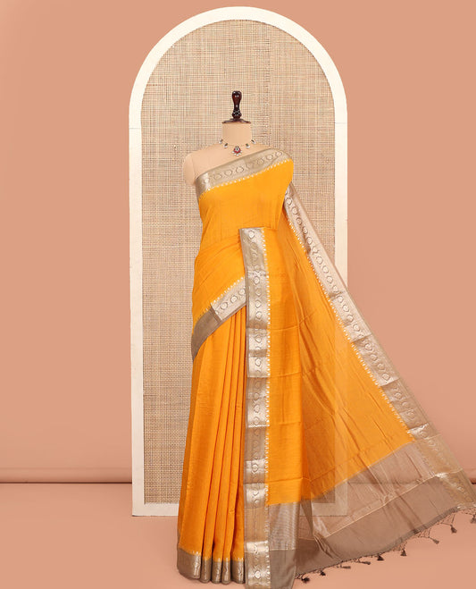 Yellow Plain Assam Silk Saree, Complemented by Contrast Zari Border of Floral Creeper Designs, Pallu Depicts Zari Stripes, and Paired with a Contrast Blouse