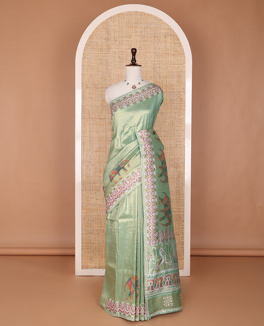 Green butta enclosed buttas designer saree, ikkat diamond patterned stone work border, and ikkat peacock printed pallu