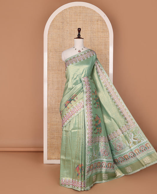 Green butta enclosed buttas designer saree, ikkat diamond patterned stone work border, and ikkat peacock printed pallu