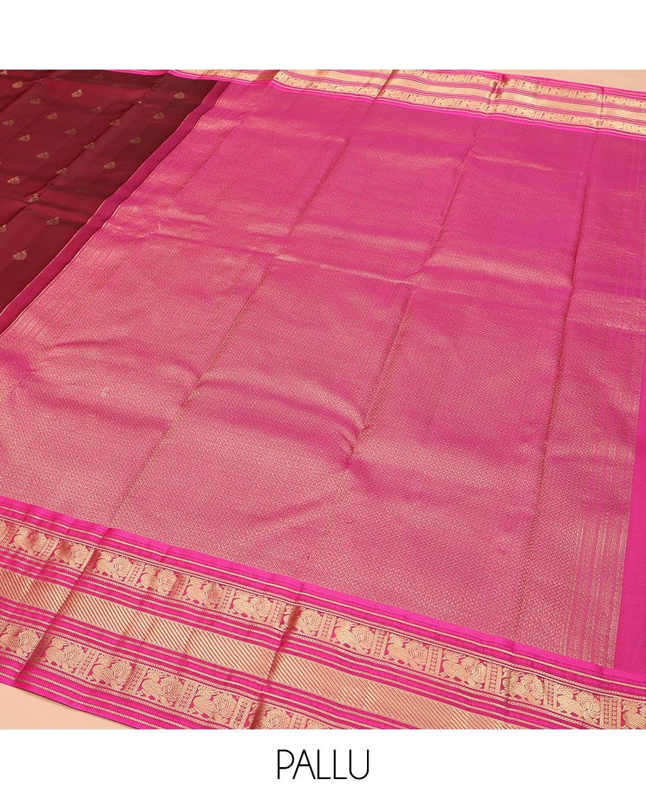 Red Kanchipuram Silk Saree, Opulently Embellished with Mayil Buttas on Its Body, Complemented by Contrast Border of Kathir, and Mayil Designs, Pallu Depicting Mayil Kann Designs, and Paired with a Contrast Blouse