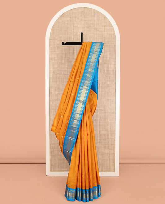 Yellow Kanchipuram Silk Saree, Dazzled with Zari Buttas on Its Body, Complemented by a Contrast One-Sided Korvai Border of Rekku, Banaras, Muthu, and Jaal Designs, Pallu of Zari Designs, and Comes Without a Blouse