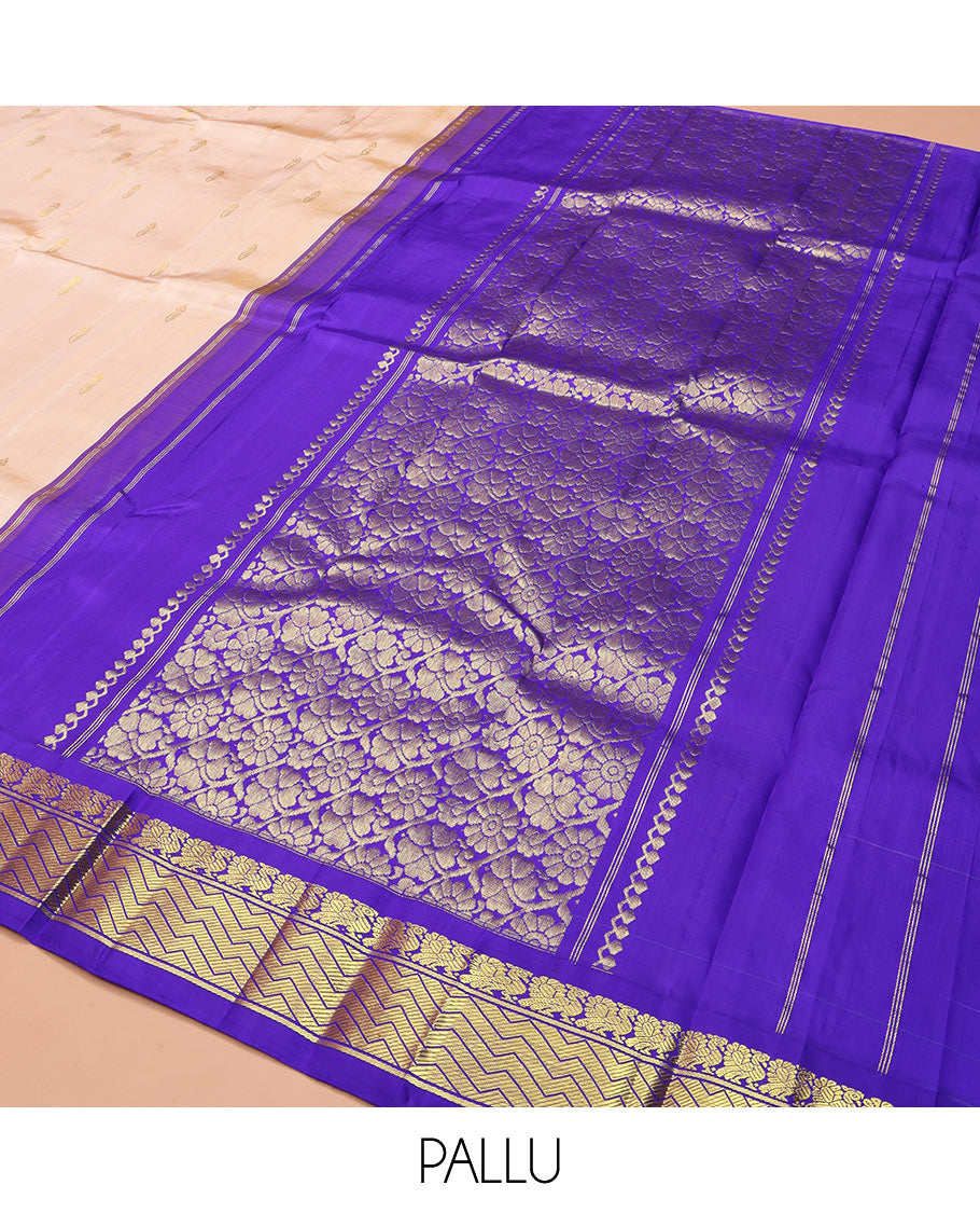 Light Sandal Kanchipuram Silk Saree, Delicately Woven with Zari Buttas on Its Body, Complemented by a Contrast One-Sided Korvai Border of Mayil, and Chevron Designs, Pallu of Floral Jaal Designs, and Comes Without a Blouse