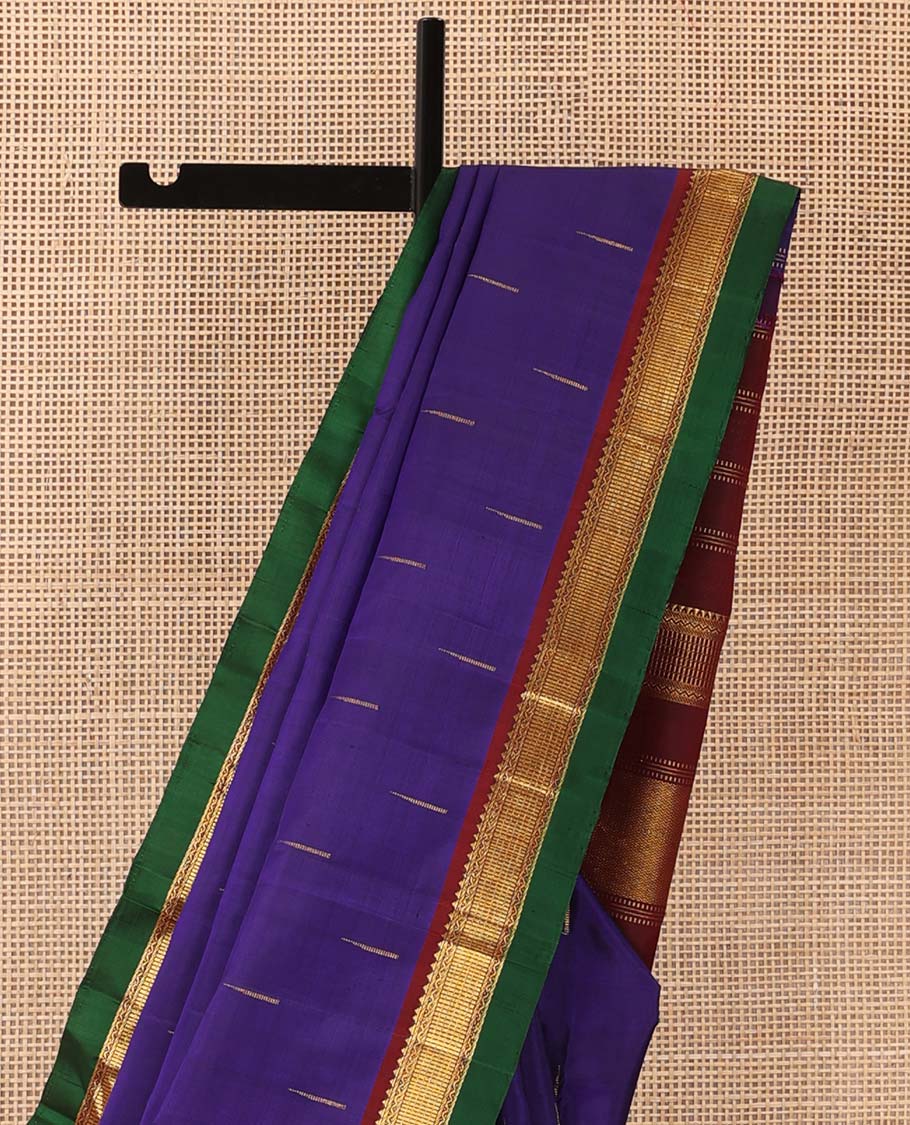Blue malli mokku buttas Kanchipuram silk saree, contrast border of rekku, neli, and zari designs, and zari woven pallu
