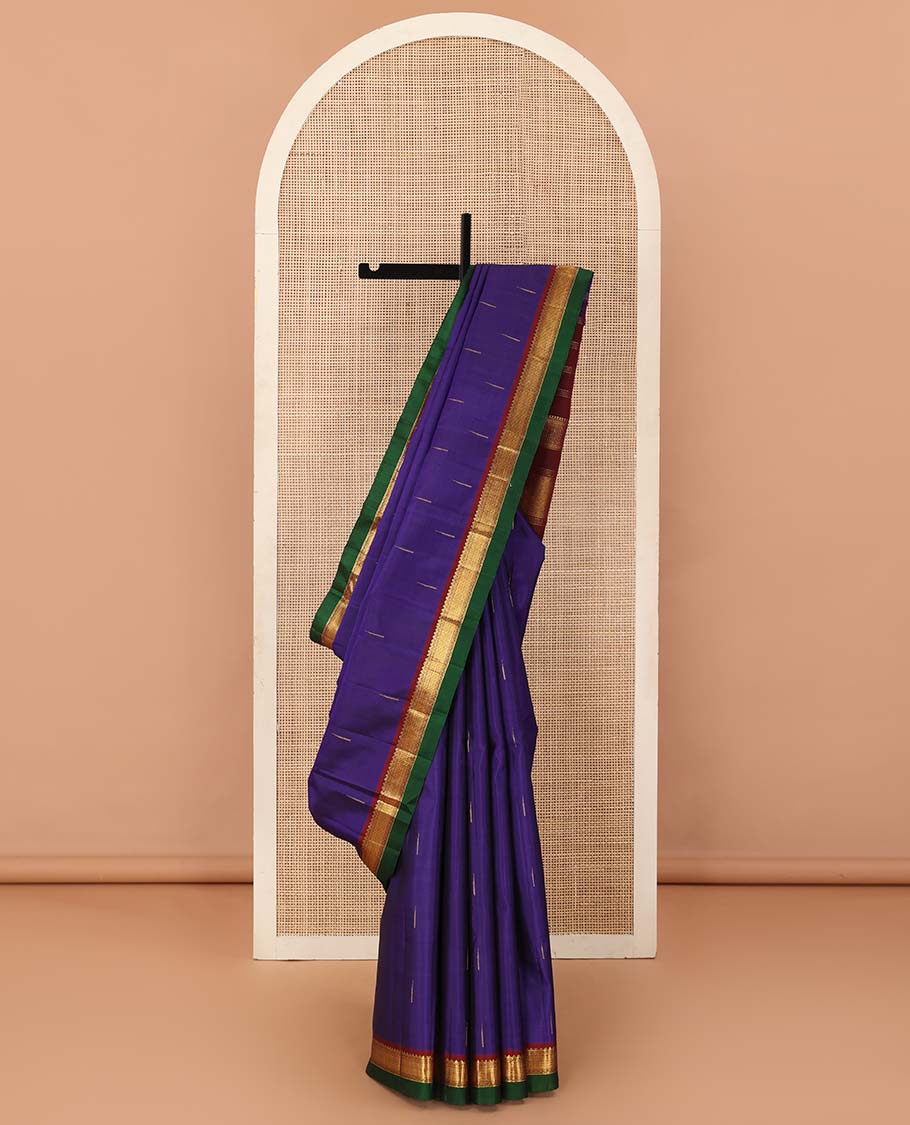 Blue malli mokku buttas Kanchipuram silk saree, contrast border of rekku, neli, and zari designs, and zari woven pallu