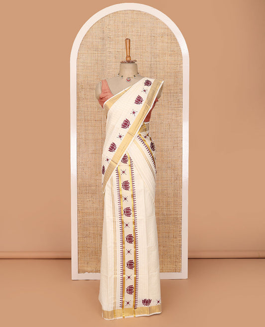 Cream striped & lotus motifs printed Kerala mundu set with zari border