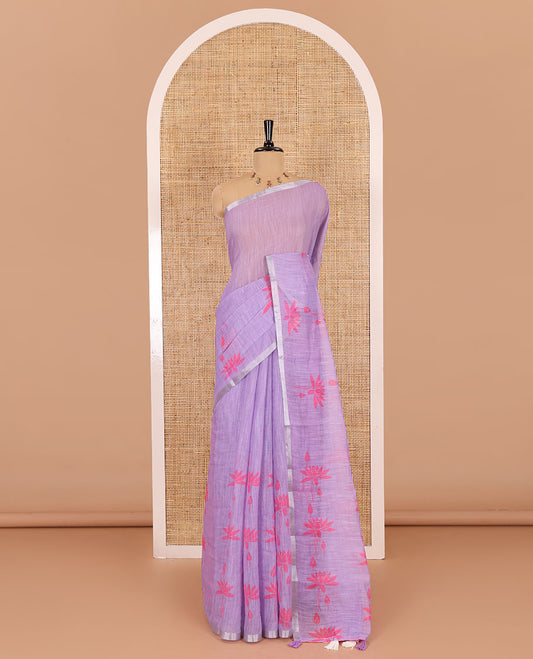 Lavender Pichwai lotus printed linen cotton saree, piping zari border, colorful tasselled lotus printed pallu, and a contrast lotus printed blouse