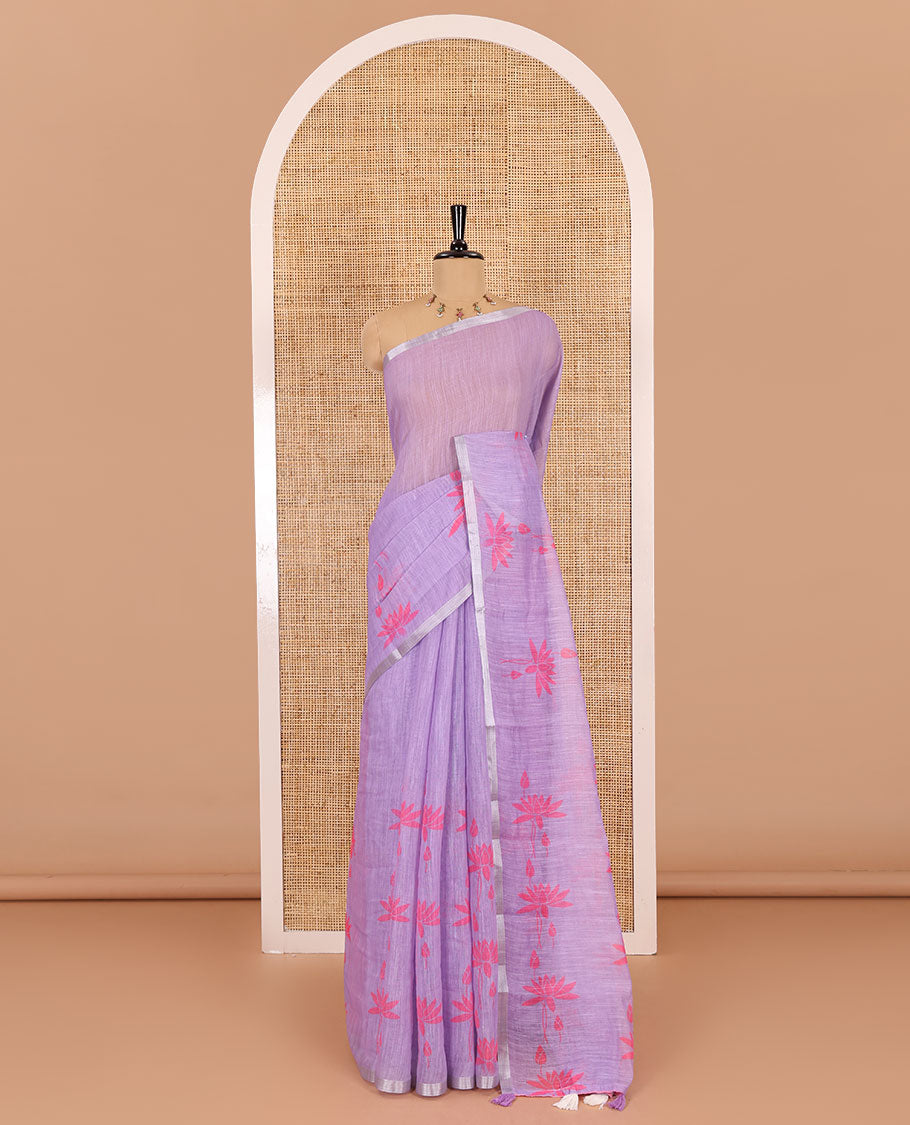 Lavender Pichwai lotus printed linen cotton saree, piping zari border, colorful tasselled lotus printed pallu, and a contrast lotus printed blouse