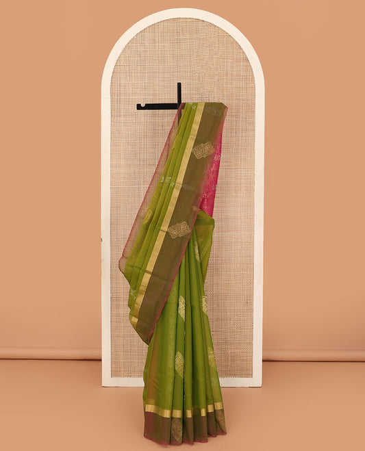Green floral creeper and zari buttas silk cotton saree, contrast zari buttas border, and zari floral diamond patterned pallu