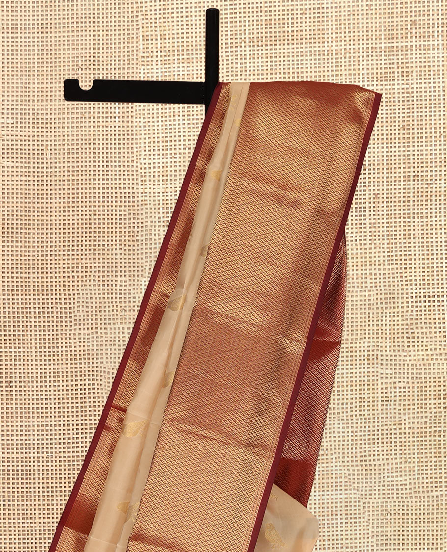 Sandal Vasundhara Lite Silk Mix Saree, Adorned with Pakshi Buttas, a Contrast Mayil Kann Border, Grand Pallu, and a Contrast Blouse