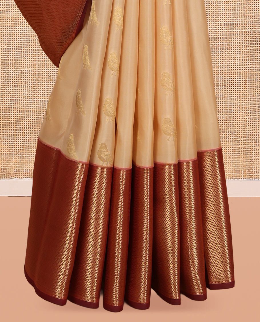 Sandal Vasundhara Lite Silk Mix Saree, Adorned with Pakshi Buttas, a Contrast Mayil Kann Border, Grand Pallu, and a Contrast Blouse
