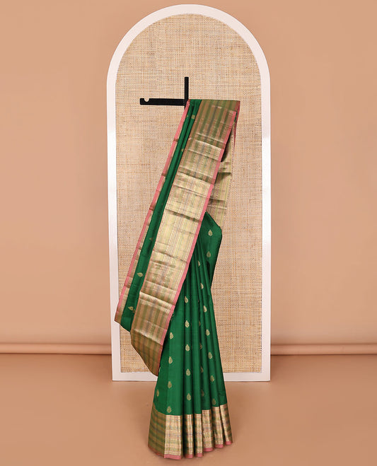 Green buttas silk saree with contrast border of rekku, muthu, paun, banaras design & zari design pallu