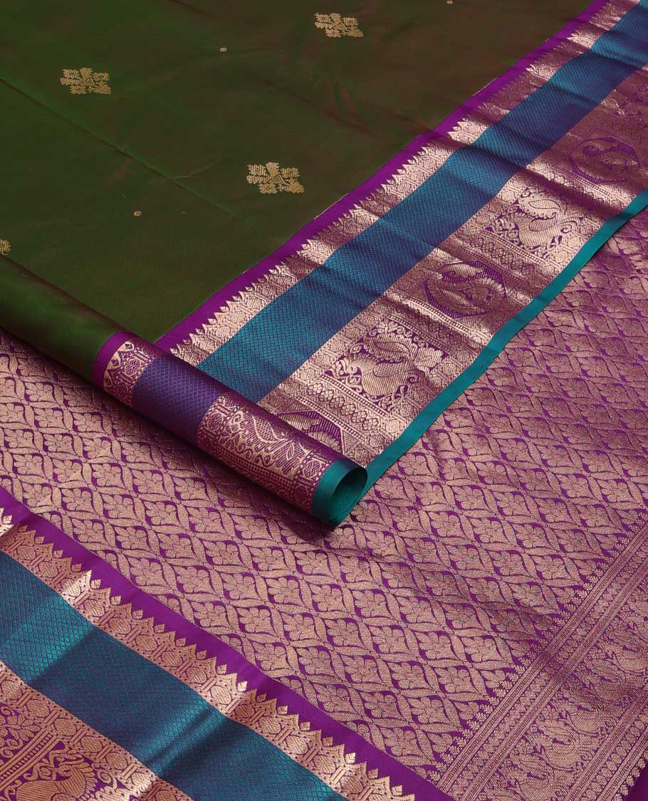 Green zari buttas silk saree, contrast border of rudraksham, mayil kann, kamalam, manga, and mayil designs , and jaal pallu