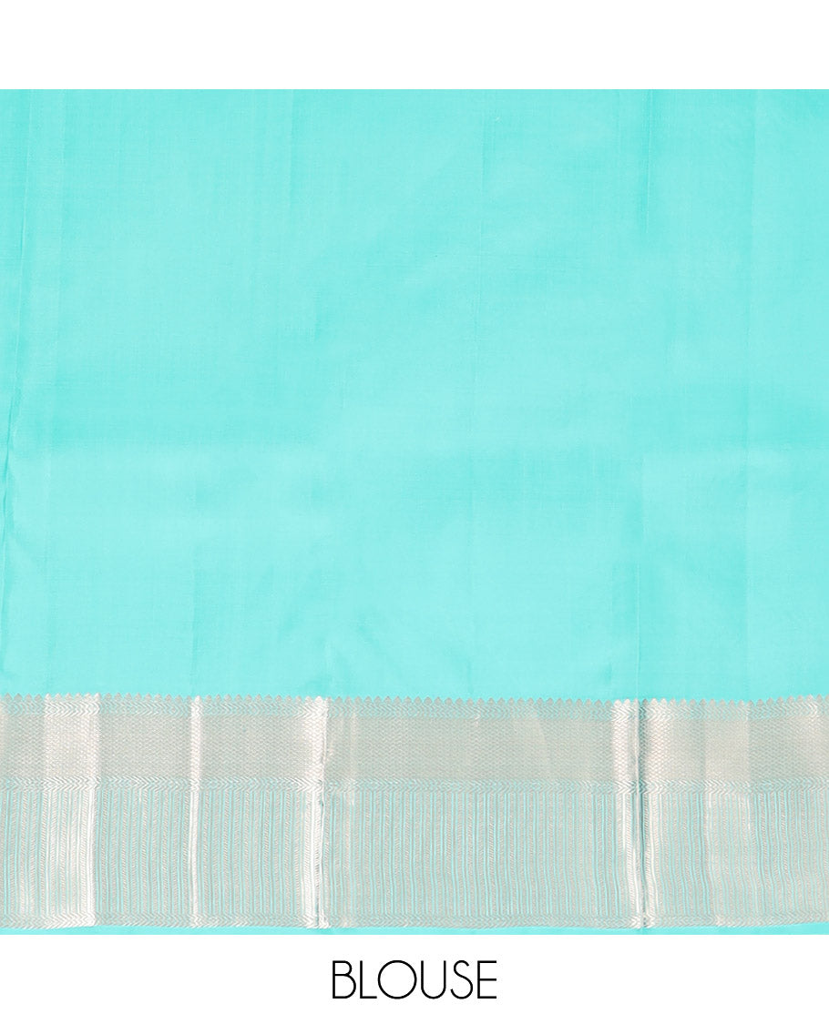 Blue Kanchipuram Wedding Silk Saree Subtly Sparkled with Jacquard Designs, Highlighted with Zari Border of Thilakam Mokku, Banaras, and Mayil Kann Designs, Grandly Zari Woven Pallu, and Paired with a Matching Blouse
