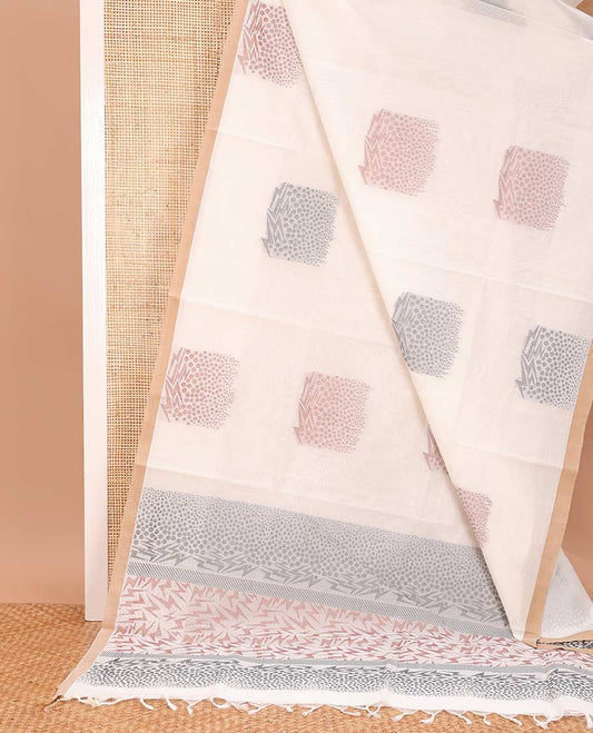 Cream buttas Coimbatore cotton saree, contrast border, and pallu of geometric designs
